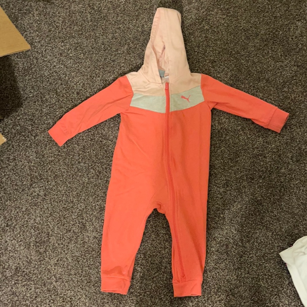 Puma zip up jump suit.